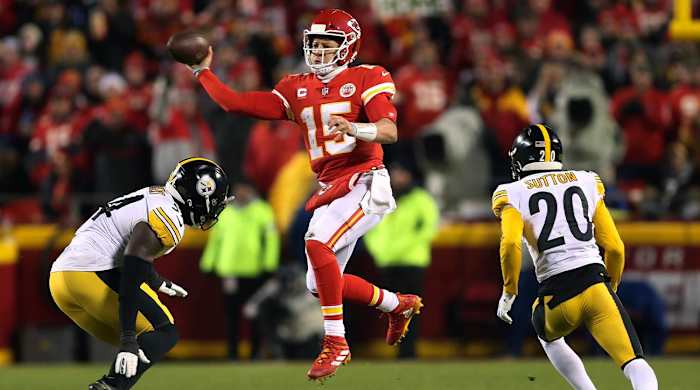 Kansas City Chiefs quarterback Patrick Mahomes (15) throws a pass during the first half of an NFL wild-card playoff football game against the Pittsburgh Steelers, Sunday, Jan. 16, 2022, in Kansas City, Mo.