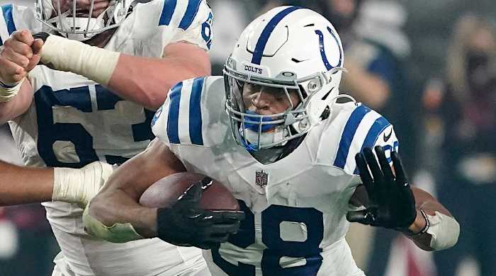 FILE - Indianapolis Colts running back Jonathan Taylor (28) plays against the Arizona Cardinals during an NFL football game on Dec. 25, 2021, in Glendale, Ariz. Taylor was named to The Associated Press 2021 NFL All-Pro Team, announced Friday, Jan. 14, 2022.