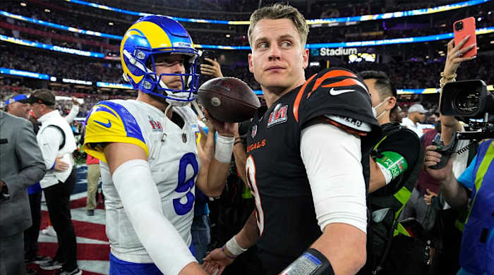 Los Angeles Rams quarterback Matthew Stafford, left, talks with Cincinnati Bengals quarterback Joe Burrow after the NFL Super Bowl 56 football game Sunday, Feb. 13, 2022, in Inglewood, Calif. (AP Photo/Chris O'Meara)