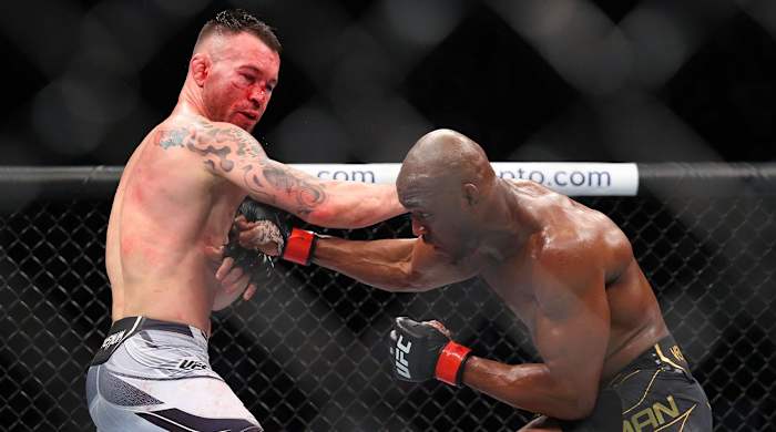 Nov 6, 2021; New York, NY, USA; Kamaru Usman (red gloves) competes against Colby Covington (blue gloves) during UFC 268 at Madison Square Garden.