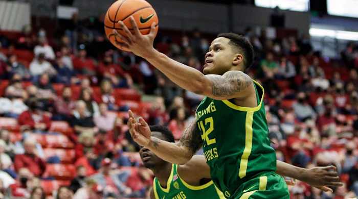Oregon guard Jacob Young shoots during the second half of an NCAA college basketball game against Washington State, Saturday, March 5, 2022, in Pullman, Wash. Washington State won 94-74.
