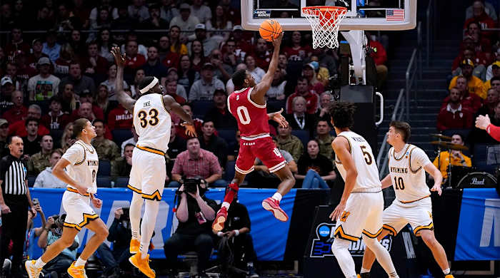 Indiana guard Xavier Johnson (0) shoots during the first half of the team’s First Four game against Wyoming in the NCAA men’s college basketball tournament Tuesday, March 15, 2022, in Dayton, Ohio.