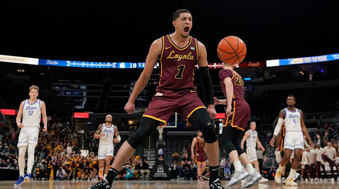 Loyola of Chicago’s Lucas Williamson (1) celebrates during the first half of an NCAA college basketball game against Drake in the championship of the Missouri Valley Conference tournament Sunday, March 6, 2022, in St. Louis.