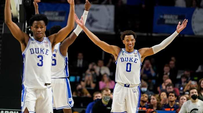 Duke’s Jeremy Roach (3) and Wendell Moore Jr. (0) celebrate after a win against Michigan State in a college basketball game in the second round of the NCAA tournament, Sunday, March 20, 2022, in Greenville, S.C.