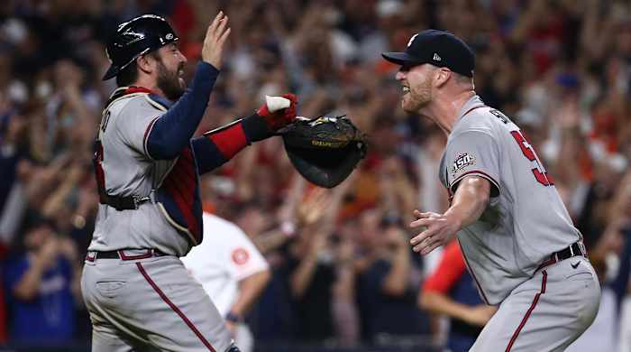 Nov 2, 2021; Houston, TX, USA; Atlanta Braves relief pitcher Will Smith (51) and catcher Travis d’Arnaud (16) celebrate after defeating the Houston Astros in game six of the 2021 World Series at Minute Maid Park.