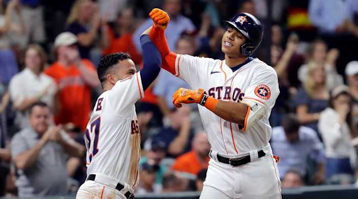 Houston Astros’ Jose Altuve, left, and Jeremy Pena celebrate Pena’s home run against the Detroit Tigers during the fifth inning of a baseball game Thursday, May 5, 2022, in Houston.