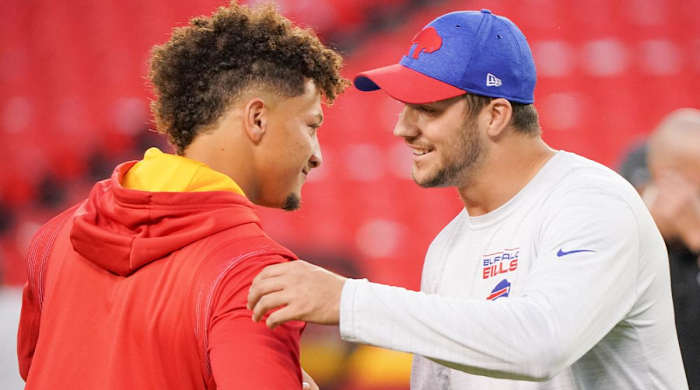 Oct 10, 2021; Kansas City, Missouri, USA; Kansas City Chiefs quarterback Patrick Mahomes (15) talks with Buffalo Bills quarterback Josh Allen (17) before warm ups at GEHA Field at Arrowhead Stadium.