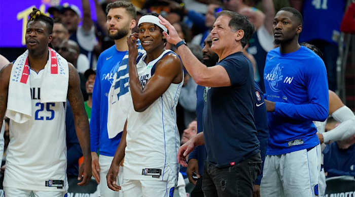 Dallas Mavericks owner Mark Cuban and players celebrate during the second half of Game 7 of an NBA basketball Western Conference playoff semifinal against the Phoenix Suns, Sunday, May 15, 2022, in Phoenix. The Mavericks defeated the Suns 123-90.