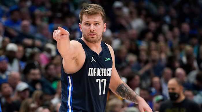 Dallas Mavericks guard Luka Doncic (77) reacts after a basket during the first half against the Golden State Warriors in Game 3 of the NBA basketball playoffs Western Conference finals, Sunday, May 22, 2022, in Dallas.