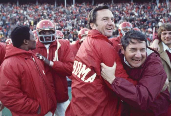 Chuck Fairbanks (center, after beating Nebraska in 1972)