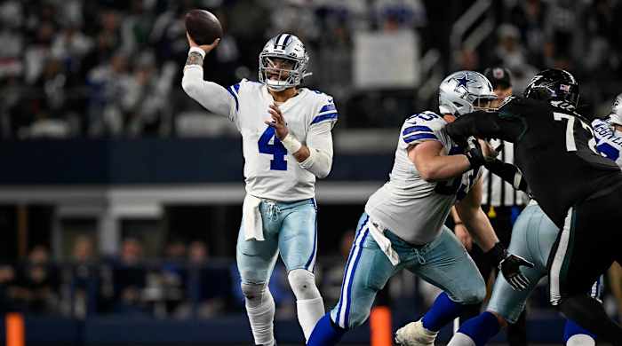 Dec 24, 2022; Arlington, Texas, USA; Dallas Cowboys quarterback Dak Prescott (4) passes against the Dallas Cowboys during the second half at AT&T Stadium.