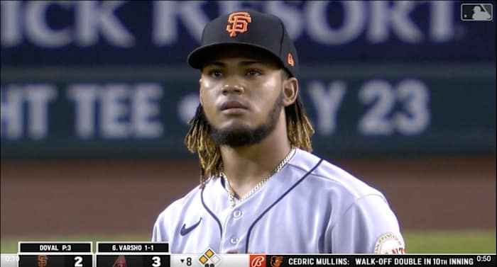 Camilo Doval reacts after giving up a home run to Daulton Varsho