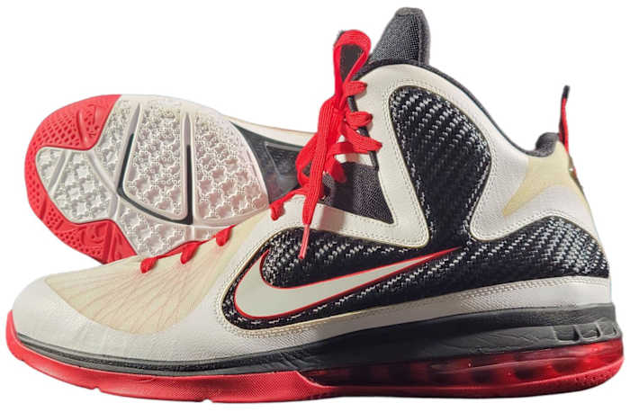 View of white, navy, and red Nike LeBron shoes.