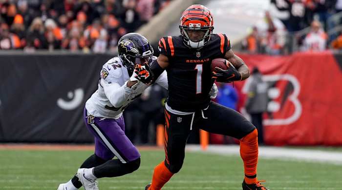 Cincinnati Bengals wide receiver Ja’Marr Chase (1) breaks away from Baltimore Ravens safety Marcus Williams (32) on a reception in the first quarter of the NFL Week 18 game between the Cincinnati Bengals and the Baltimore Ravens at Paycor Stadium in downtown Cincinnati on Sunday, Jan. 8, 2023.
