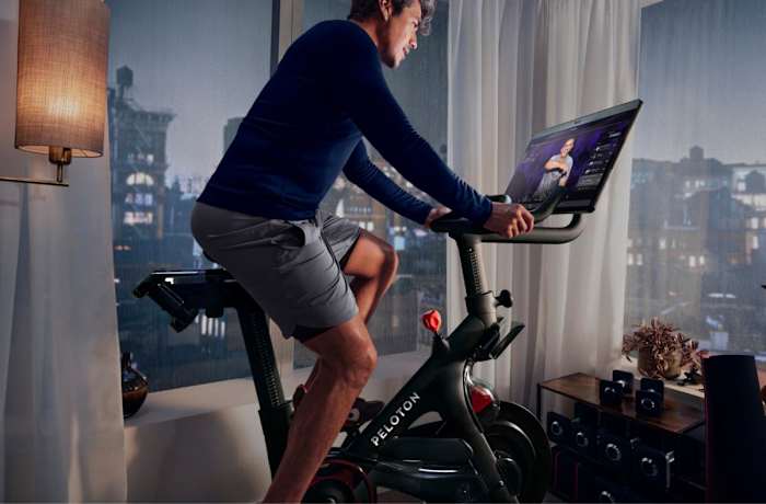 peloton bike plus person