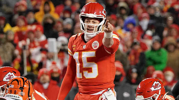 Jan 29, 2023; Kansas City, Missouri, USA; Kansas City Chiefs quarterback Patrick Mahomes (15) gestures before the snap against the Cincinnati Bengals during the third quarter of the AFC Championship game at GEHA Field at Arrowhead Stadium.