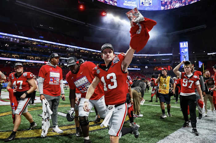 Quarterback Stetson Bennett celebrates after Georgia's 2023 Peach Bowl victory (Photo by Tony Walsh)