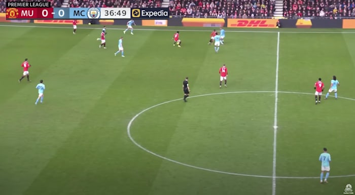Manchester United playing against Manchester City.
