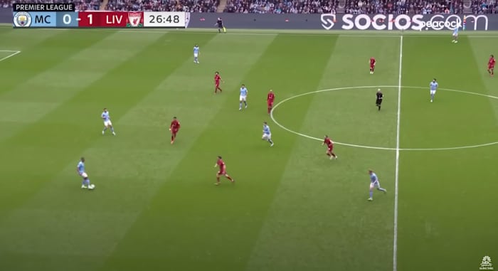 Man City playing against Liverpool.