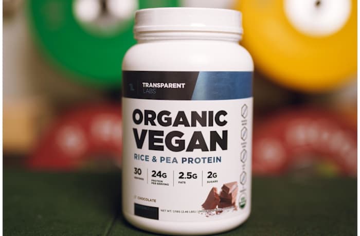 White container with blue writing of Transparent Labs Organic Vegan Rice and Pea Protein, one of our favorite pea protein picks