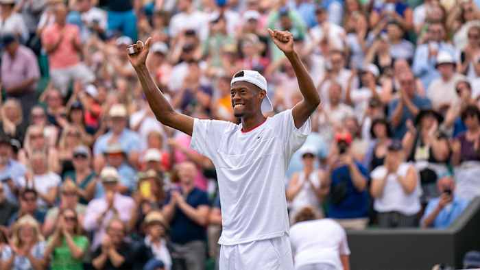 Christopher Eubanks celebrates after defeating Stefanos Tsitsipas