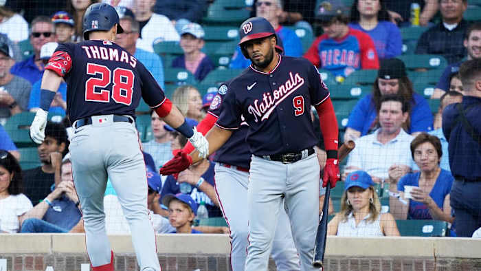 Washington Nationals outfielder Lane Thomas, infielder Jeimer Candelario