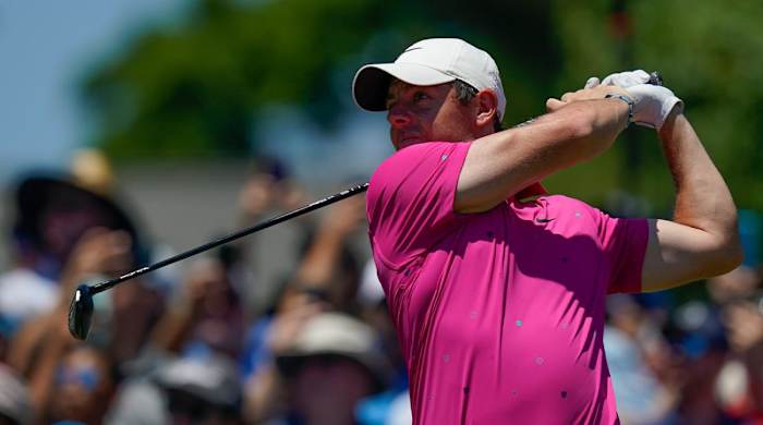 Rory McIlroy, of Northern Ireland, hits off the first tee during the third round of the Travelers Championship golf tournament at TPC River Highlands, Saturday, June 25, 2022, in Cromwell, Conn.