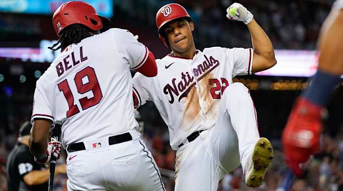 Washington Nationals’ Juan Soto, right, celebrates with Josh Bell after his solo home run during the fourth inning of a baseball game against the New York Mets at Nationals Park, Monday, Aug. 1, 2022, in Washington.