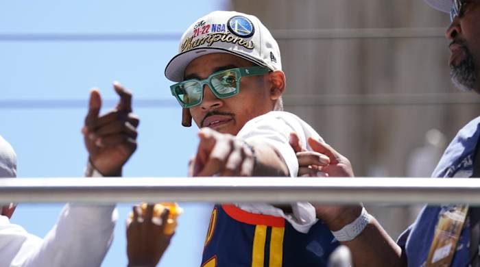 Jun 20, 2022; San Francisco, CA, USA; Golden State Warriors guard Jordan Poole points towards fans during the Warriors championship parade in downtown San Francisco.