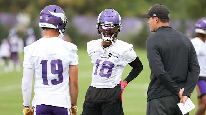 Jul 28, 2022; Minneapolis, MN, USA; Vikings head coach Kevin O’Connell and wide receivers Justin Jefferson (18) and Adam Thielen (19) talk during training camp at TCO Performance Center.