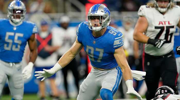 Detroit Lions defensive end Aidan Hutchinson reacts after tackling Atlanta Falcons running back Qadree Ollison during the first half of a preseason NFL football game, Friday, Aug. 12, 2022, in Detroit.