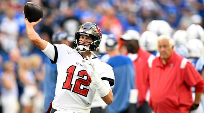 Aug 27, 2022; Indianapolis, Indiana, USA; Tampa Bay Buccaneers quarterback Tom Brady (12) warms up before the game against the Indianapolis Colts at Lucas Oil Stadium.