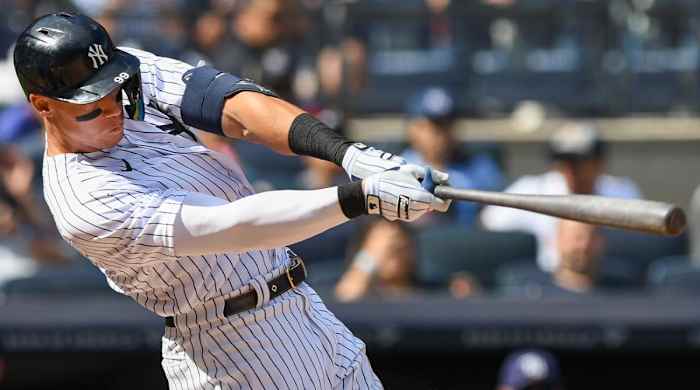 Sep 10, 2022; Bronx, New York, USA; New York Yankees center fielder Aaron Judge (99) hits a single against the Tampa Bay Rays during the sixth inning at Yankee Stadium.