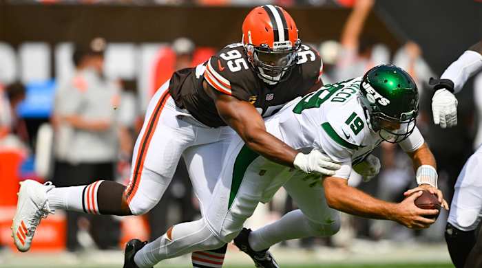 Cleveland Browns defensive end Myles Garrett (95) sacks New York Jets quarterback Joe Flacco (19) during the first half of an NFL football game, Sunday, Sept. 18, 2022, in Cleveland.