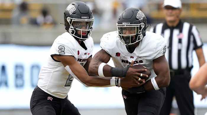 Sep 10, 2022; Berkeley, California, USA; UNLV Rebels quarterback Doug Brumfield (2) hands off to running back Aidan Robbins (9) during the third quarter against the California Golden Bears at FTX Field at California Memorial Stadium.