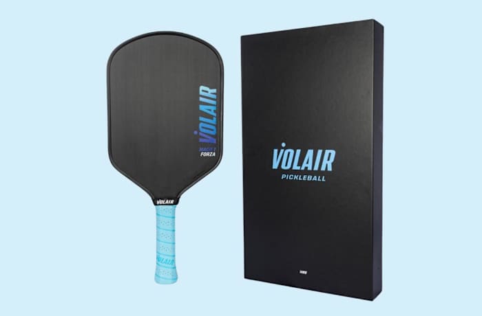 Volair Mach Forza Pickleball paddle with a black hitting surface and a light blue handle next to a black Volair box with light blue writing. Our pick for the best pickleball paddle for advanced players.