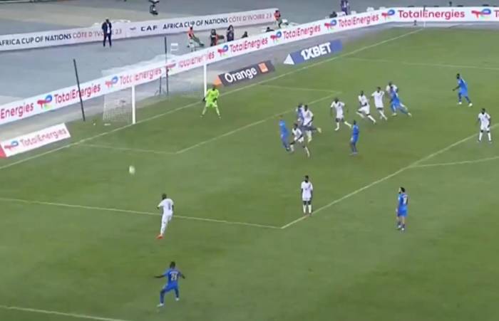 Arthur Masuaku pictured (bottom) moments after shooting from a wide free-kick that resulted in an amazing goal for DR Congo against Guinea at the 2023 Africa Cup of Nations