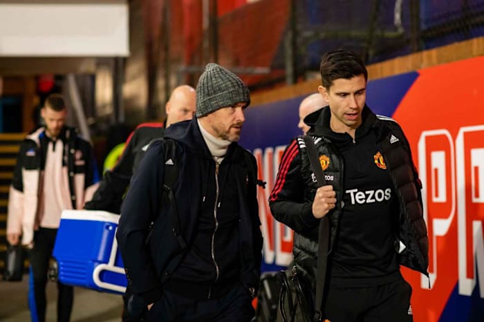 Manchester United coaches Erik ten Hag and Eric Ramsay talking