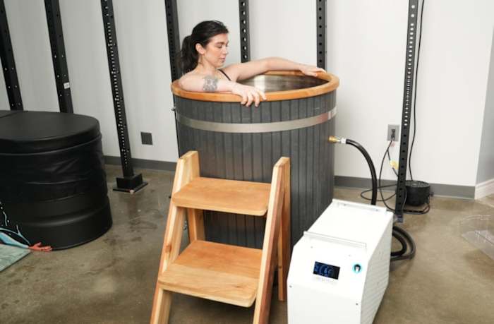 Woman in Polar Monkeys cold plunge tub