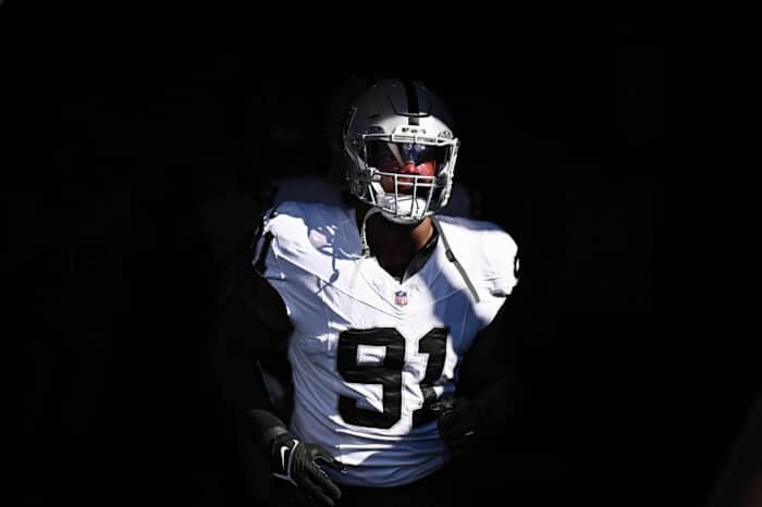 Las Vegas Raiders defensive tackle Bilal Nichols (91) takes the field to warm up before a game against the Chicago Bears at Soldier Field.
