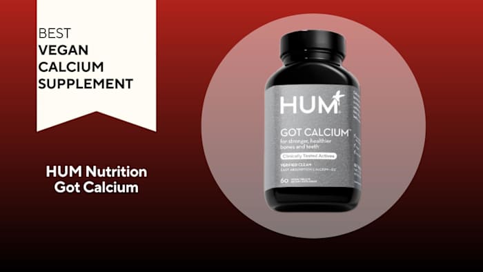 A red background with a white banner that says, "Best Vegan Calcium Supplement" next to a black and grey container that says HUM Got Calcium in white font