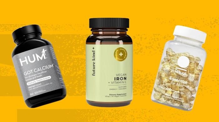 A yellow background with three bottles of the best vegan vitamins