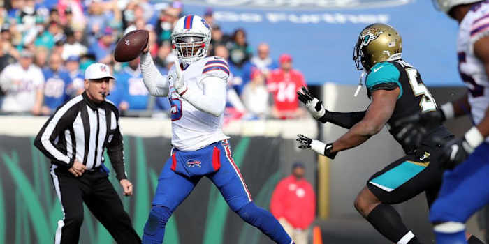 Taylor (in white) helped the Bills end their 17-year playoff drought in 2017.