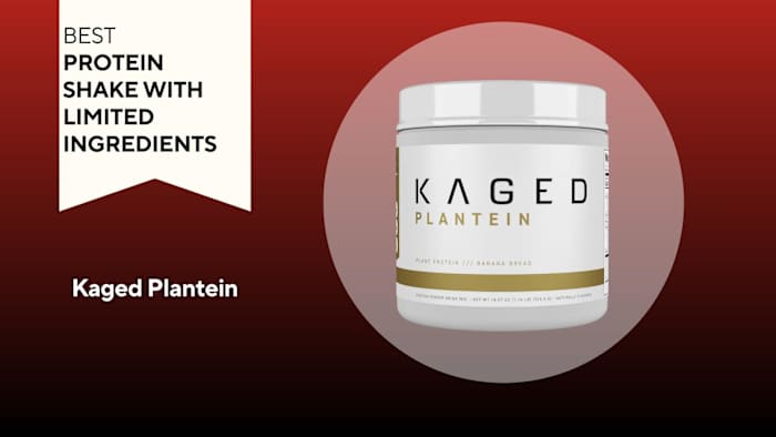 A red background with a white banner reading "Best Protein Shake with Limited Ingredients" next to a white and gold container of Kaged Plantein plant protein powder in Vanilla flavor