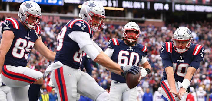 Mike Gesicki (second from left) engages in the "most embarrassing" Griddy celebration after guiding the Patriots to a winning score