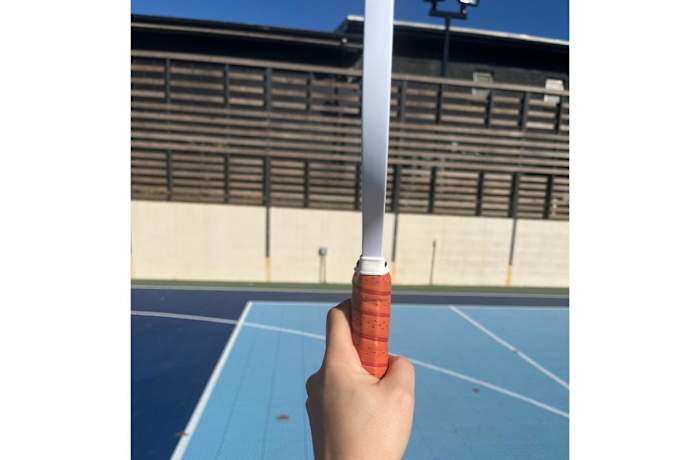 Viewed from above, your thumb and fingers should form a "V" shape.