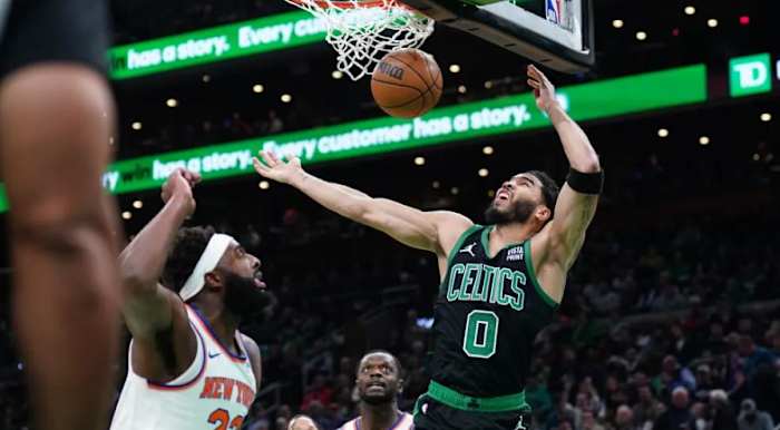 Mitchell Robinson and Julius Randle can only watch as two of Jayson Tatum's 35 points fall in Monday's loss in Boston