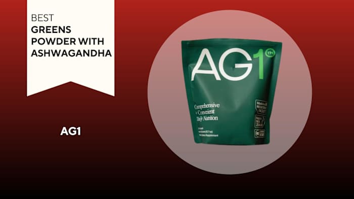 A packet of AG1 against a red background