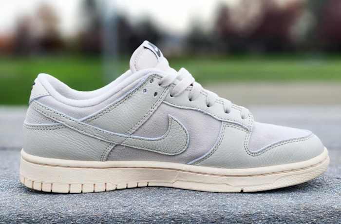 nike-dunk-low-on-table-grassy-background