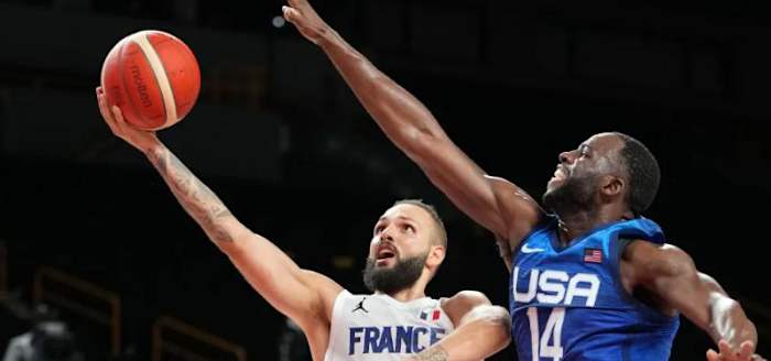 Fournier (L) competes for France